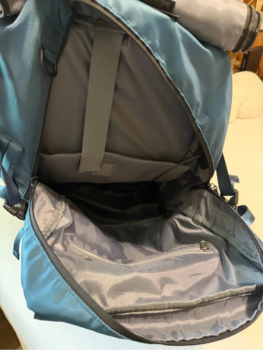 Blue Men's Travel Backpack with Multiple Compartments